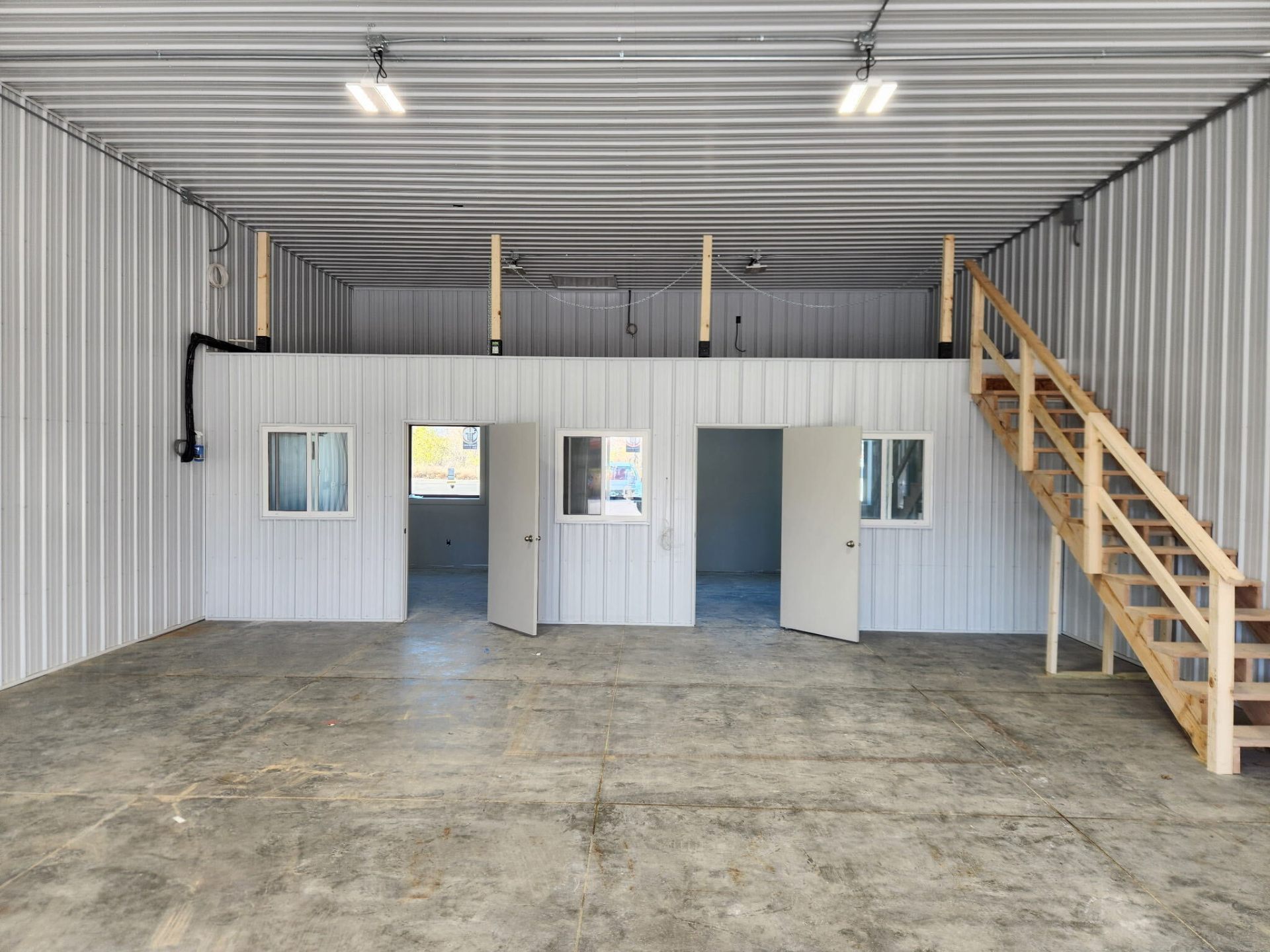 Commercial buildout with office rooms and stair access